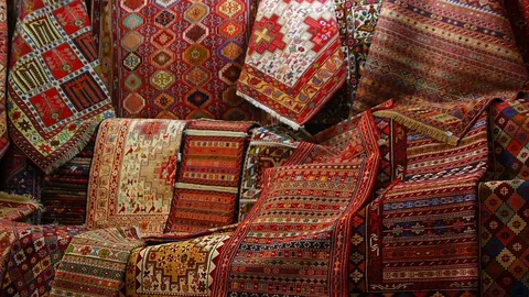تصویر 1 از قیمت خرید قالیچه دستباف قرمز با فروش عمده